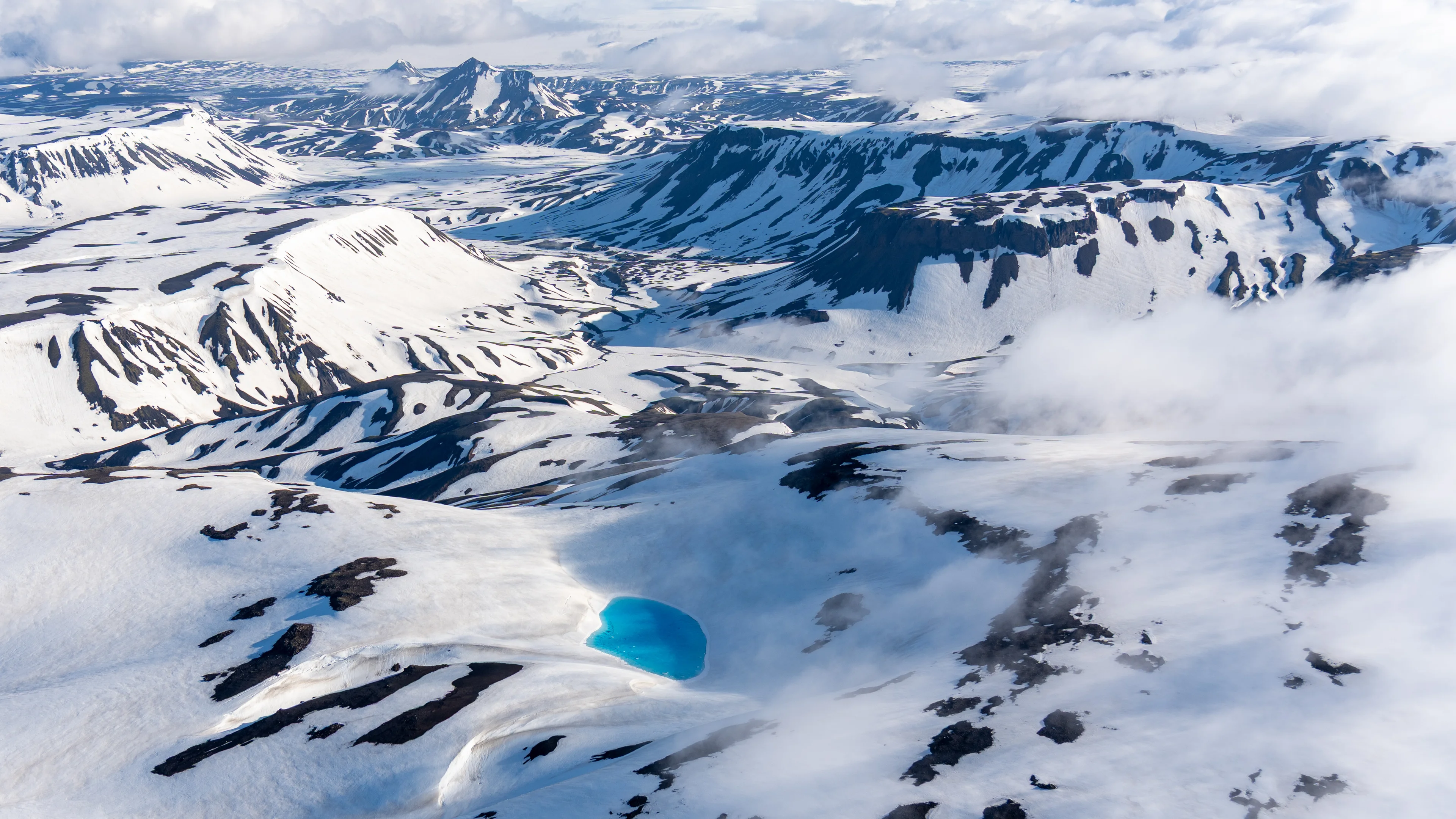 Paramotor flying over scenic landscape